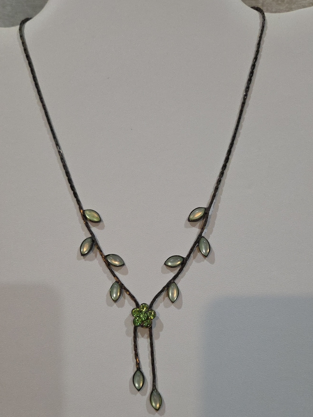 DARK METAL CHAIN WITH GREEN CABOCHON STYLE STONES